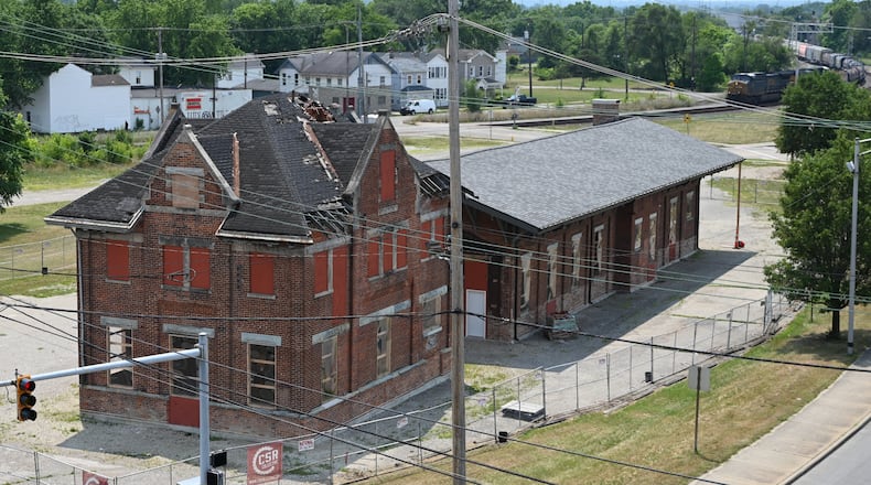 The CSX Train Depot, which was relocated north by 1,000-plus feet in December 2022 and January 2023 to the corner of Maple Avenue and Martin Luther King Jr. Boulevard. The city of Hamilton is seeking RFPs from companies to purchase and develop the property. Pictured is the depot on June 17, 2024, from the top floor of the parking garage at the corner of Maple Avenue and MLK Boulevard. MICHAEL D. PITMAN/STAFF