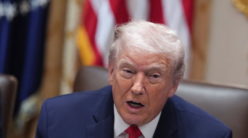 President Donald Trump speaks during a cabinet meeting at the White House, Thursday, Jan. 29, 2026, in Washington. (AP Photo/Evan Vucci)