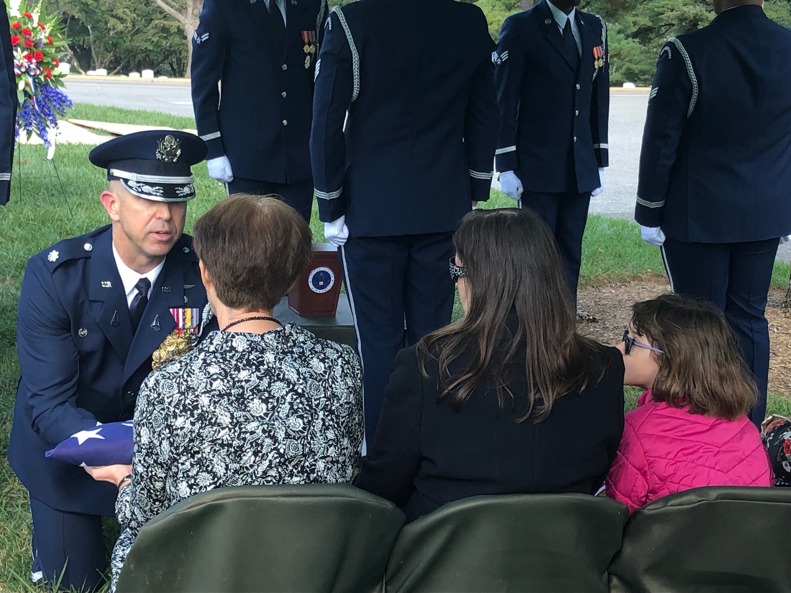 Debbie McCrabb, whose husband Maris was buried last week at Arlington National Cemetery, is presented a folded American flag. RICK McCRABB/STAFF