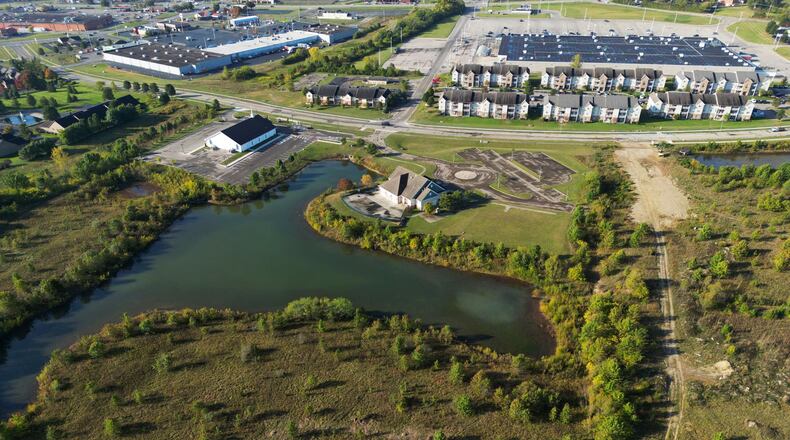 Residents to the south of a proposed apartment development (to the bottom of the pictured retention pond) expressed concerns about the 272-unit proposed complex. However, many concerns and questions have been addressed in additional meetings. The project is expected to be vote on at Hamilton City Council's Nov. 8 meeting. NICK GRAHAM/STAFF