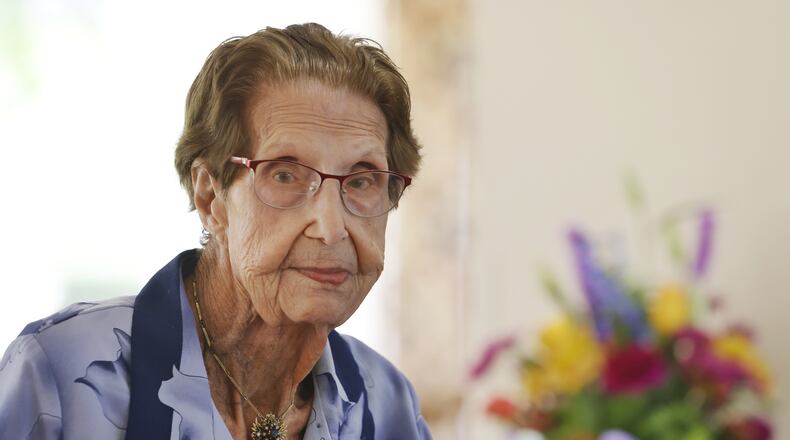 Mary McComb celebrates her 103rd birthday with a party at Bradford Place Wednesday, July 7 in Hamilton. NICK GRAHAM / STAFF
