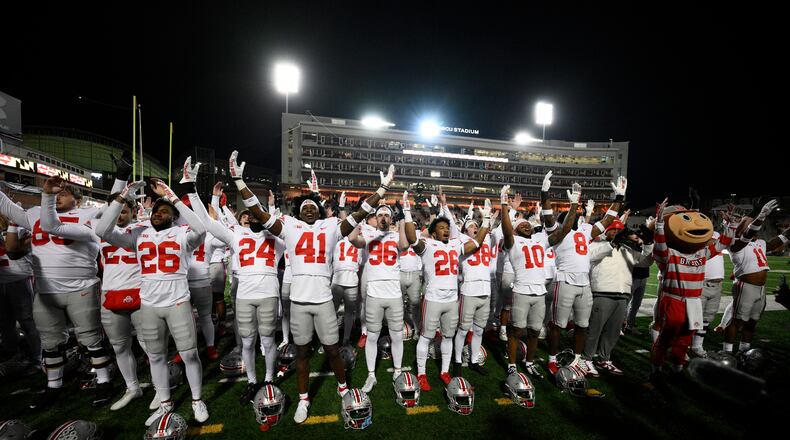 Ohio State celebrates after an NCAA college football game against Maryland, Saturday, Nov. 19, 2022, in College Park, Md. Ohio State won 43-30. (AP Photo/Nick Wass)