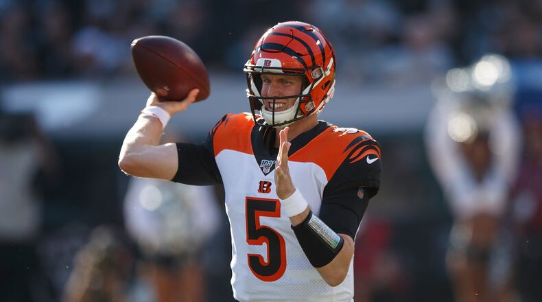 OAKLAND, CA - NOVEMBER 17: Quarterback Ryan Finley #5 of the Cincinnati Bengals passes against the Oakland Raiders during the second quarter at RingCentral Coliseum on November 17, 2019 in Oakland, California. (Photo by Jason O. Watson/Getty Images)