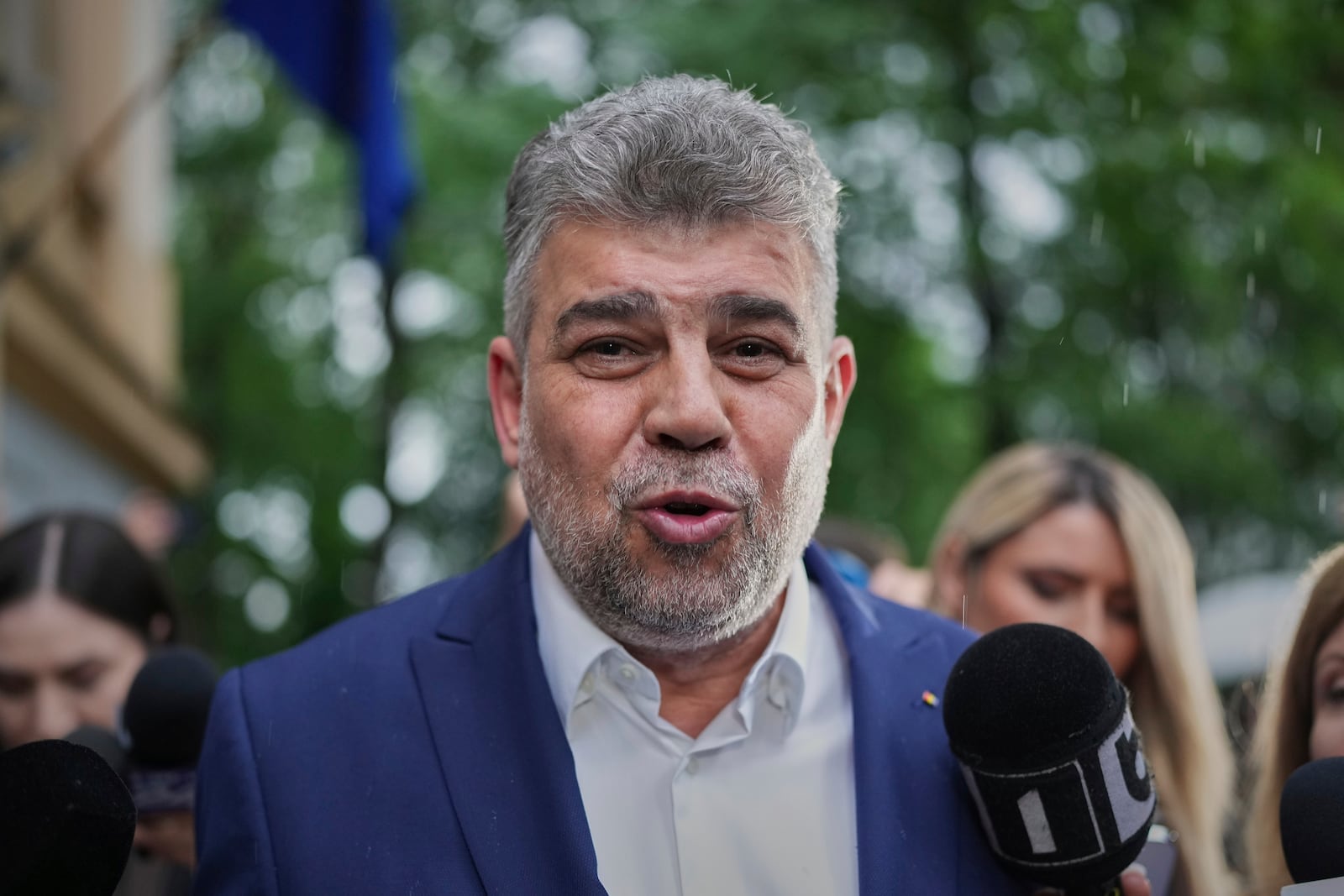 Romanian Prime Minister Marcel Ciolacu speaks to media at the PSD headquarters as he announces his resignation, in Bucharest, Romania, Monday, May 5, 2025, the day after the governing coalition's candidate failed to advance to the runoff in the presidential election rerun. (AP Photo/Andreea Alexandru)