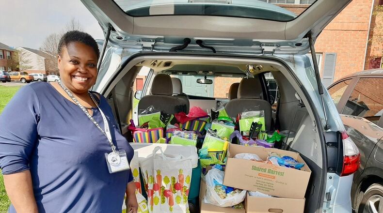 Lakota school parent and volunteer Shantelle Oyako was recently named the school district’s volunteer of the year in part for her creation of a mobile food pantry out of her van. Oyako, who volunteers 35 hours weekly, later adapted her idea for an in-school food pantry and the idea then spread throughout the other 22 schools in the 16,800-student district. (Provided Photo/Journal-News)
