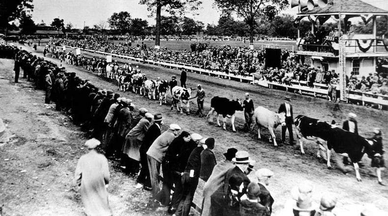 The photo is of the first 4-H Club livestock parade staged at the end of the 1925 fair. CONTRIBUTED