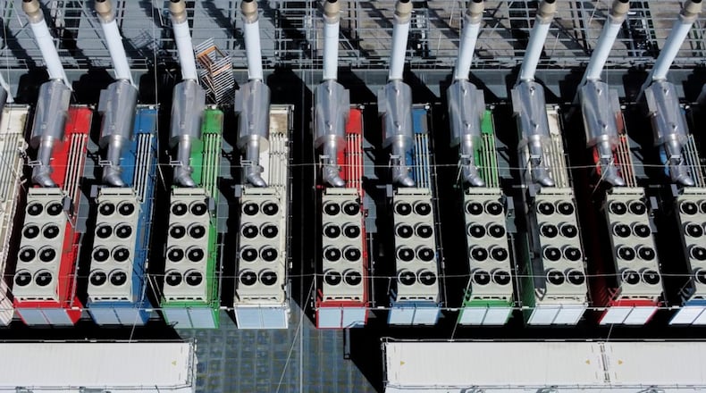 These "chillers" on the roof of a data center in Germany, seen from above, work to cool the equipment inside the building. MICHAEL PROBST/ASSOCIATED PRESS