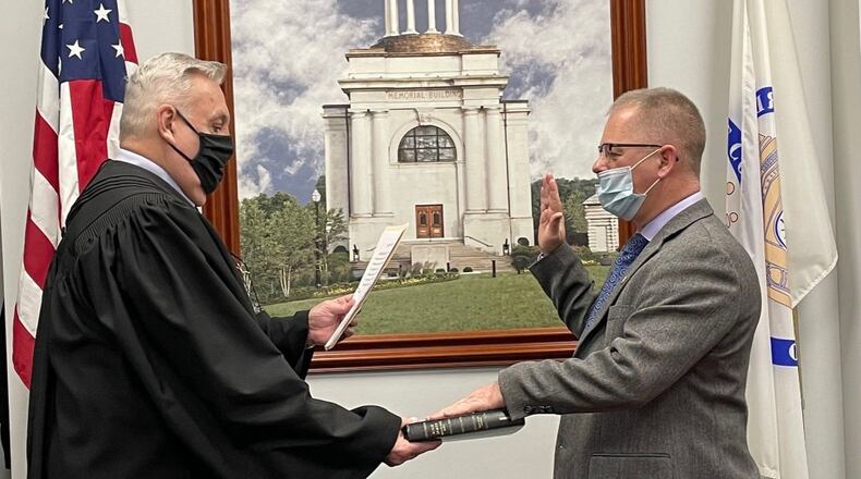 Butler County Common Pleas Court Judge Noah Powers swore in the newest member of the Veterans Service Commission Jim Eriksen on Jan. 20, 2021 and now will preside over a request to remove him.