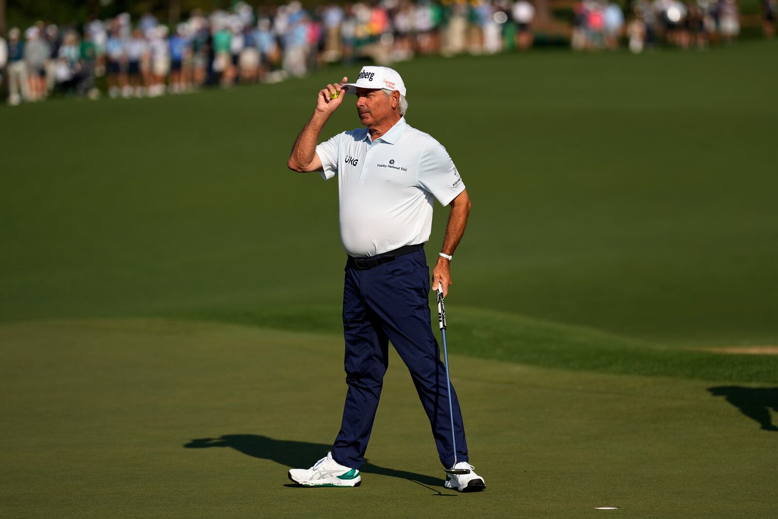 Fred Couples waves after making a putt on the second hole during the first round at the Masters golf tournament, Thursday, April 10, 2025, in Augusta, Ga. (AP Photo/George Walker IV)