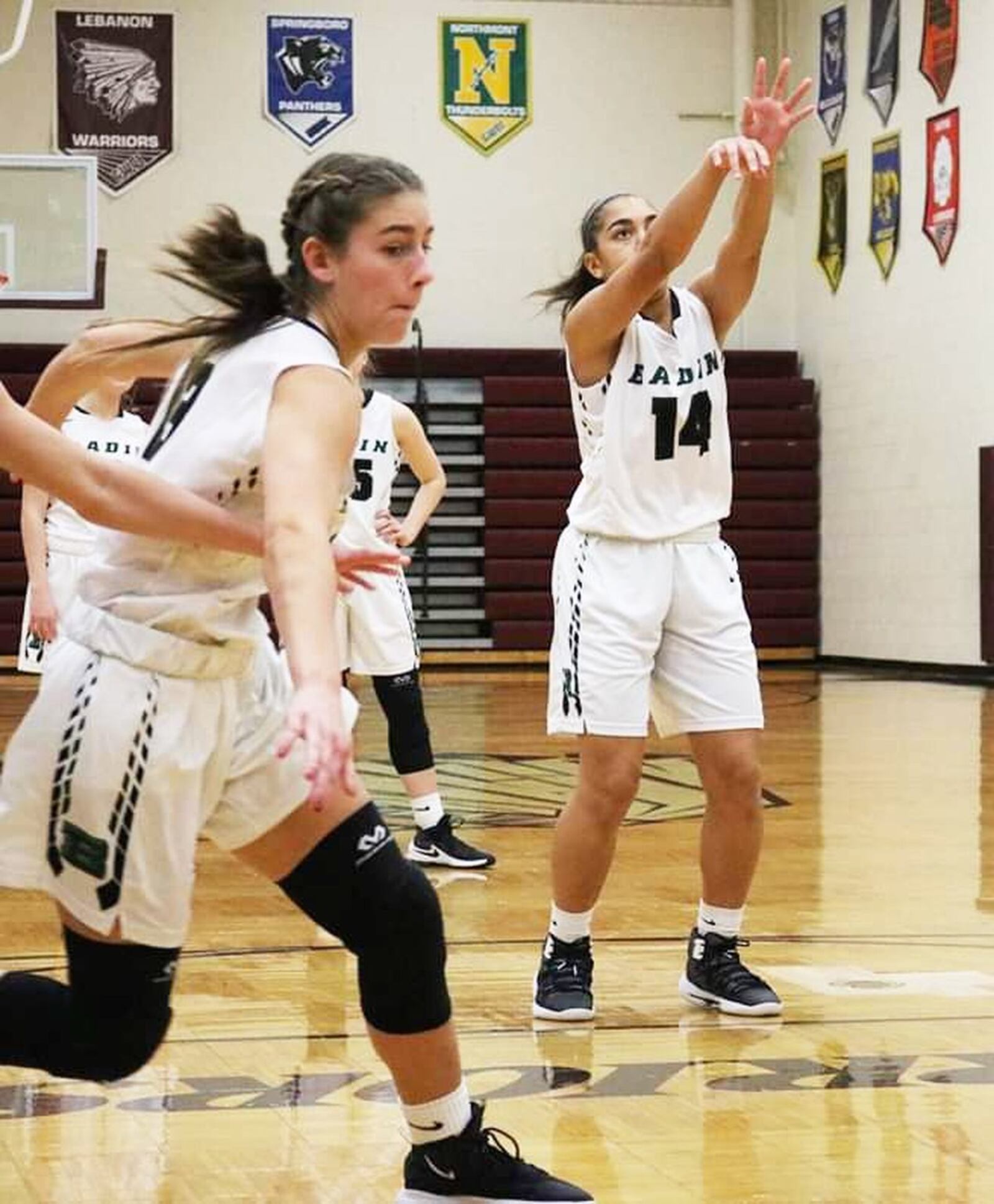 Badin’s Jayla Starks (14) shoots a free throw as teammate Becca Wolterman attempts to box out during a Division II sectional opener against Clinton-Massie on Saturday afternoon at Lebanon. Badin won 54-10. CONTRIBUTED PHOTO BY TERRI ADAMS