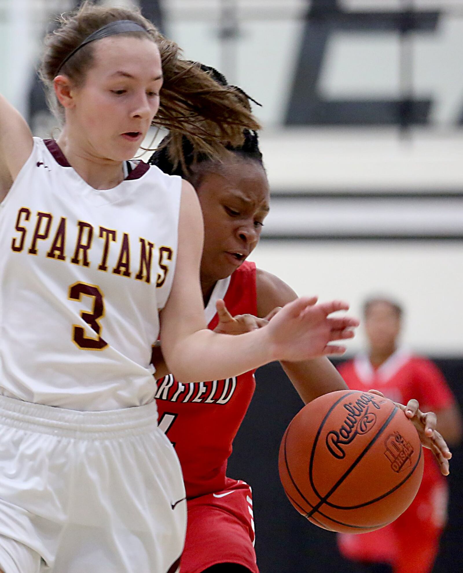 Fairfield guard Zahrya Bailey tries to move past Turpin guard Kaitlyn Workman during their Division I sectional semifinal Thursday night at Lakota East. CONTRIBUTED PHOTO BY E.L. HUBBARD