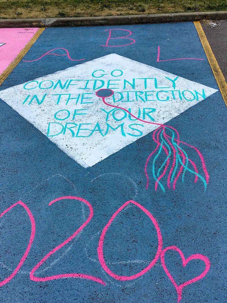 PHOTOS Lakota East seniors paint parking spots