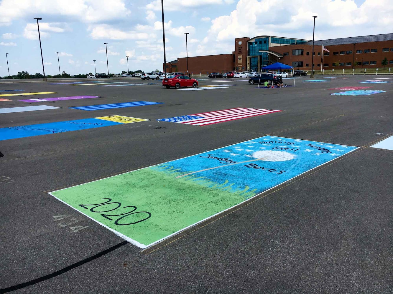 PHOTOS Lakota East seniors paint parking spots