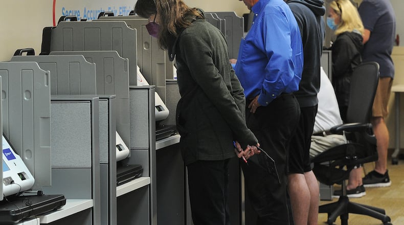 Voters at the Montgomery County Board of Elections in this file photo from Wednesday Oct. 12, 2022. MARSHALL GORBY\STAFF