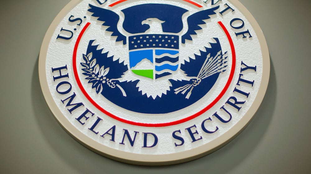 FILE - The Department of Homeland Security logo during a news conference in Washington, Feb. 25, 2015. (AP Photo/Pablo Martinez Monsivais, File)