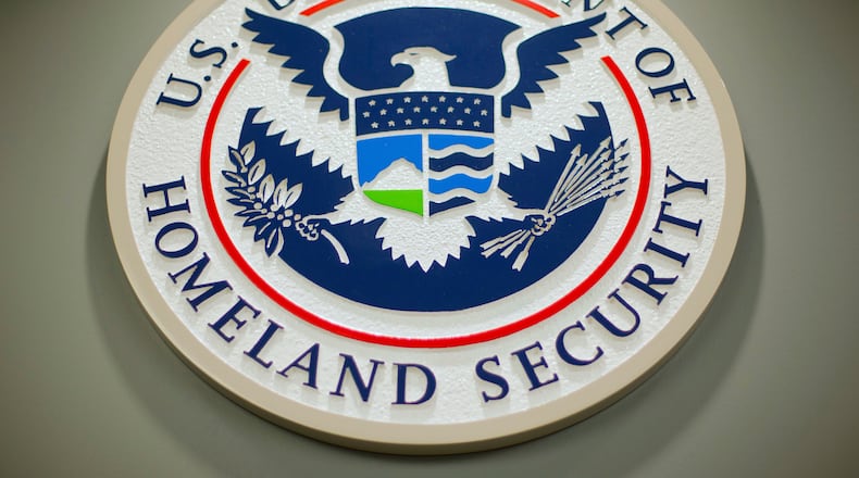 FILE - The Department of Homeland Security logo during a news conference in Washington, Feb. 25, 2015. (AP Photo/Pablo Martinez Monsivais, File)