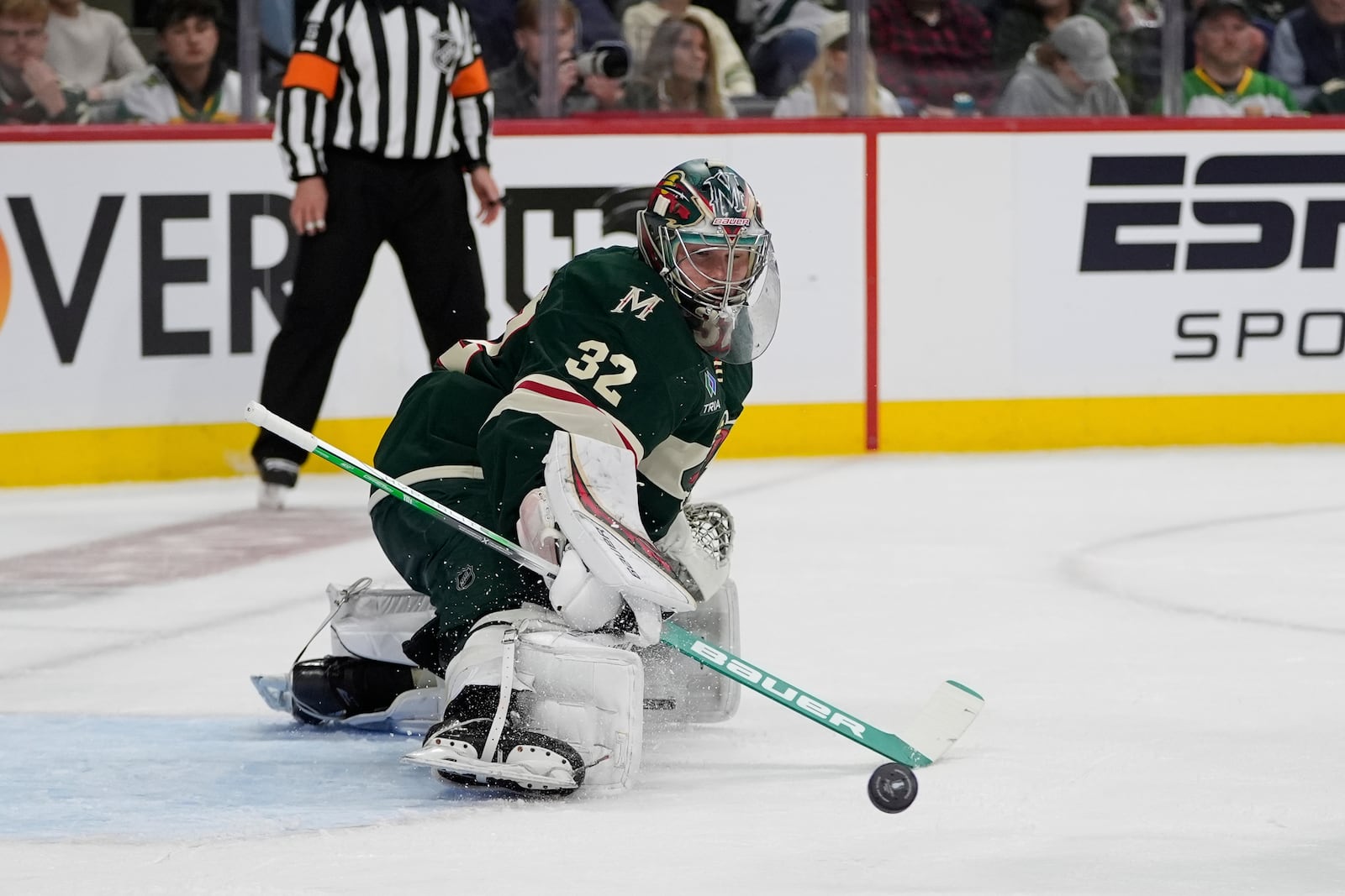 Minnesota Wild goaltender Filip Gustavsson (32) defends against a shot during the second period of Game 3 of a first-round NHL hockey playoff series against the Vegas Golden Knights, Thursday, April 24, 2025, in St. Paul, Minn. (AP Photo/Abbie Parr)