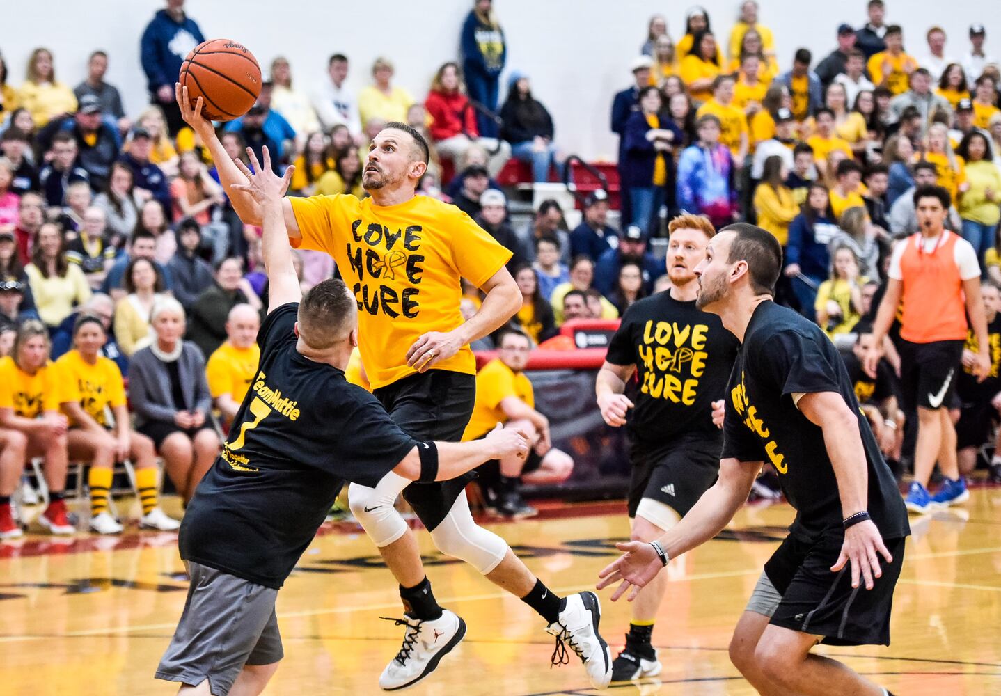 Two Butler County schools hold basketball game to benefit Madison teen battling cancer