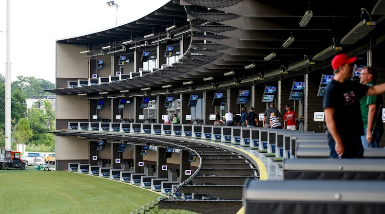 Topgolf held a preview day Wednesday, July 20 at the West Chester Township location that will open to the public on July 29. The three-level, 64,232-square-foot facility in the Streets of West Chester features 102 climate-controlled hitting bays that are able to host up to six players at one time. Microchip-embedded golf balls track distance and accuracy, awarding points for hitting targets on the outfield via nine different games for all levels.NICK GRAHAM/STAFF