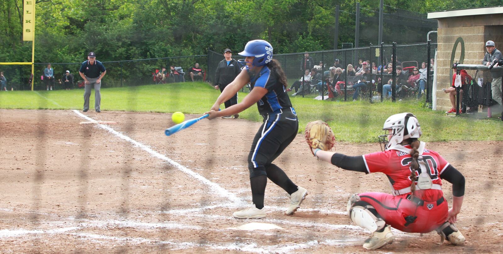Whitni Enis swings for Miami East in the Division V softball regional semifinals at Centerville May 28, 2025.