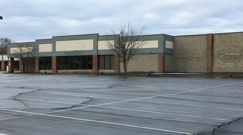 This former grocery store on South Main Street will be evaluated to determine the feasibility to convert it into a new facility for Monroe police. ED RICHTER/STAFF