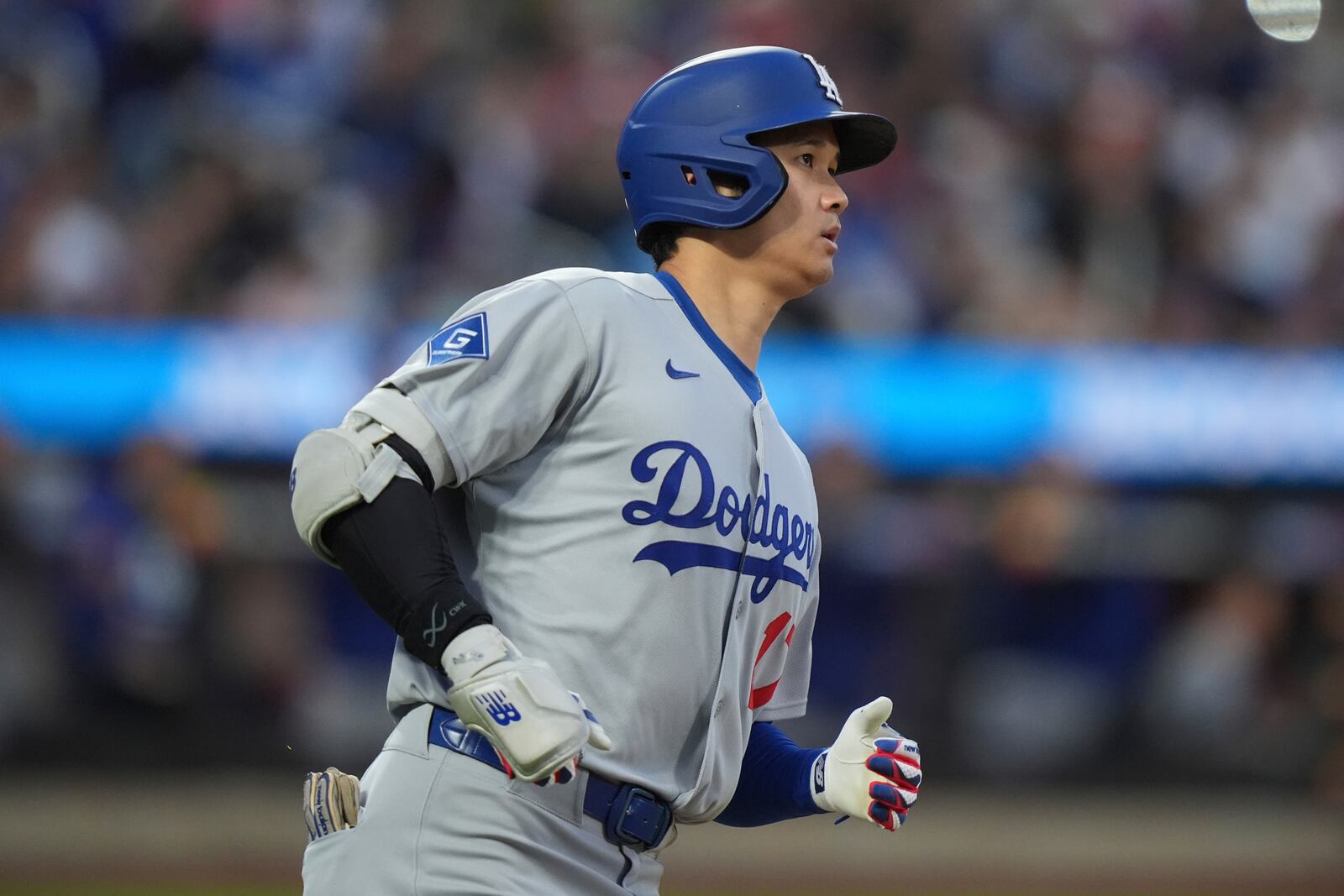 Los Angeles Dodgers' Shohei Ohtani, of Japan, reacts after hitting a line out to center field during the third inning of a baseball game against the New York Mets Saturday, May 24, 2025, in New York. (AP Photo/Frank Franklin II)