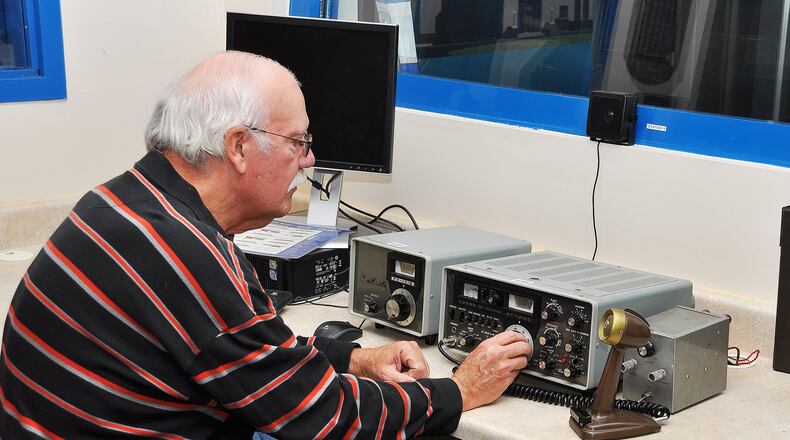 West Chester Amateur Radio Association president Dennis O’Neill operates a Yaesu FT101EE at the WCARA club station WC8VOA at the National Voice of America Museum of Broadcasting. WCARA is recruiting members of all ages to learn how to operate ham radios and join the shortwave radio club. CONTRIBUTE