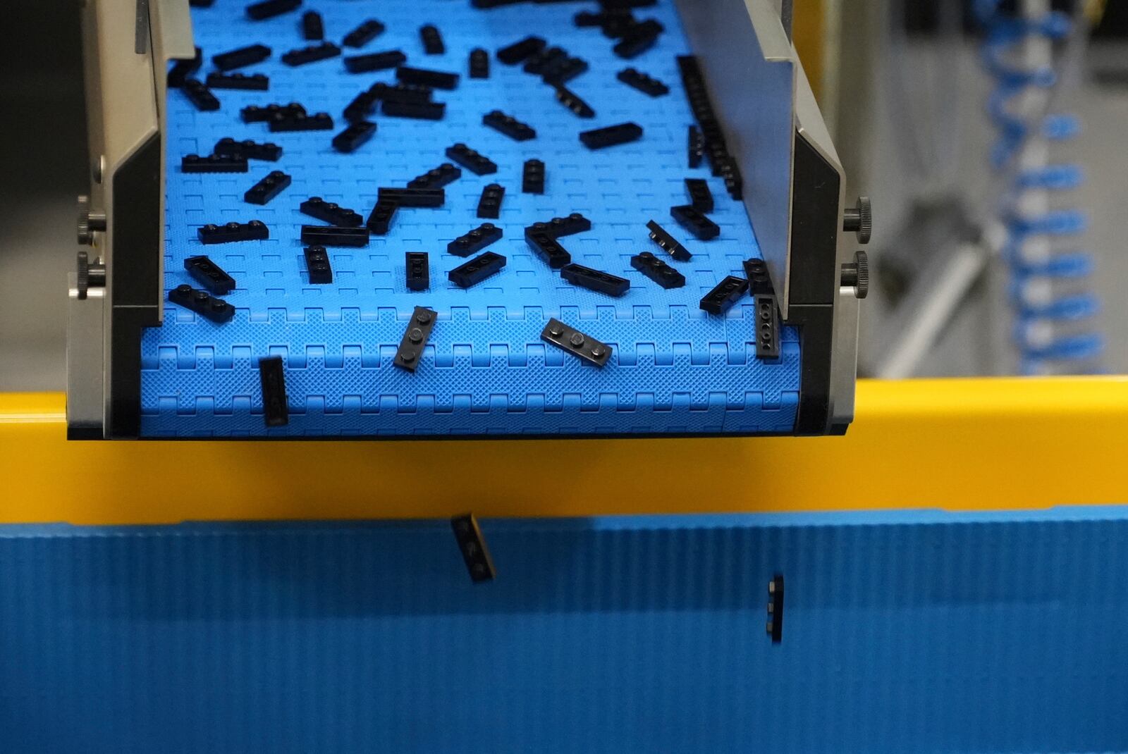 Lego bricks are moved on conveyor belt at Lego factory in Binh Duong, Vietnam Wednesday, April 2, 2025. (AP Photo/Hau Dinh)