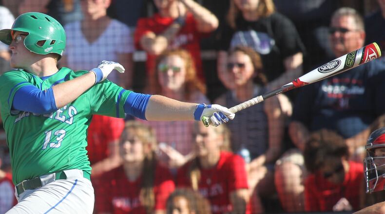 Chaminade Julienne’s Ben Thomas swings against Bishop Hartley in a Division II regional semifinal on Thursday, May 24, 2018, at Mason High School. David Jablonski/Staff
