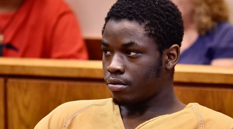 Michael Smith Jr., 17, who is charged with murder and tampering with in the shooting death of 19-year-old Shon Walker in June in Hamilton, will be tried as an adult. The case was transferred today to adult court by county juvenile Judge Ronald Craft. NICK GRAHAM/STAFF