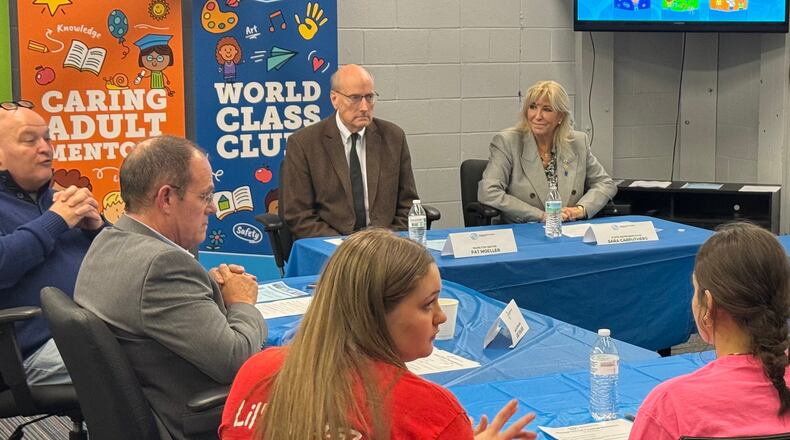 On Thursday, Jan. 25, the Boys and Girls Club of Hamilton held an elected official town hall at their Grand Boulevard club with local elected leaders and teenagers. Pictured is Hamilton Council member Joel Lauer (far left) addressing a question as others listened. MICHAEL D. PITMAN/STAFF