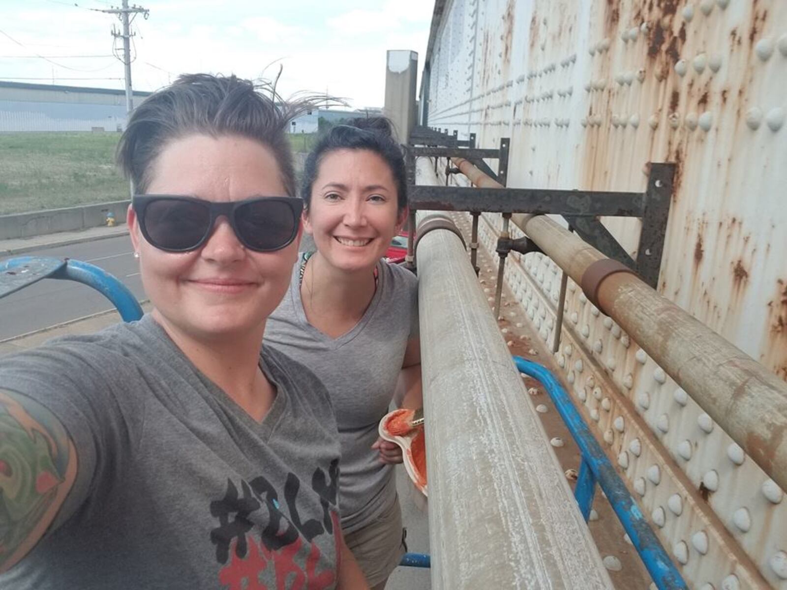 Local artists Jes McMillan is leading a group painting a train overpass near the intersection of  Keowee and First streets for the East Dayton Arts District.  Vincent Detrick, Ileana Del Campo-Gray,  Kate Edmondson and Amy Dallis are also helping with the project.