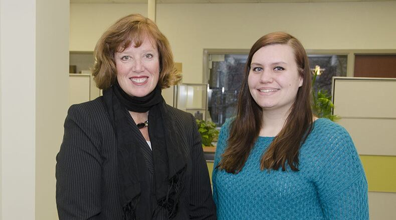 UC Blue Ash Dean Cady Short-Thompson, left, met with Chuntel Murawski, a 2010 Middletown High School graduate, to congratulate her on winning free tuition for the spring semester.
