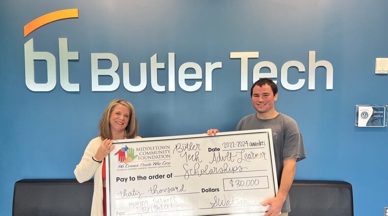 Through the Middletown Community Foundation’s Adult Learner Financial Assistance program $30,000 in financial aid to 16 adult students at Butler Tech was awarded. Butler Tech officials said the program funds scholarships to adults learning new career skills with grants between $2,000 and $2,500 to help cover their education costs. Pictured is one of the recent scholarship recipients, 31-year-old Richard Reed of Trenton, in a ceremony with Program Officer Sarah Watson of the Middletown Community Foundation. CONTRIBUTED