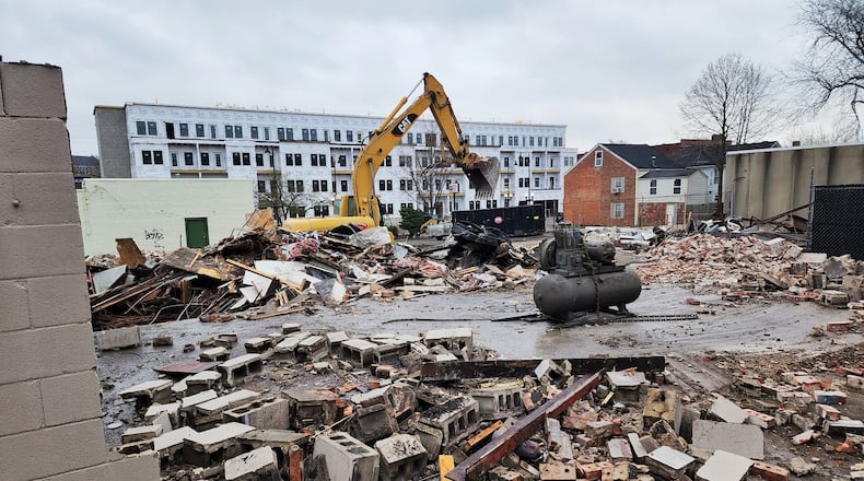 Demolition at the rear of the Main Street property in Hamilton that will eventually be an Agave & Rye restaurant has started. NICK GRAHAM/STAFF