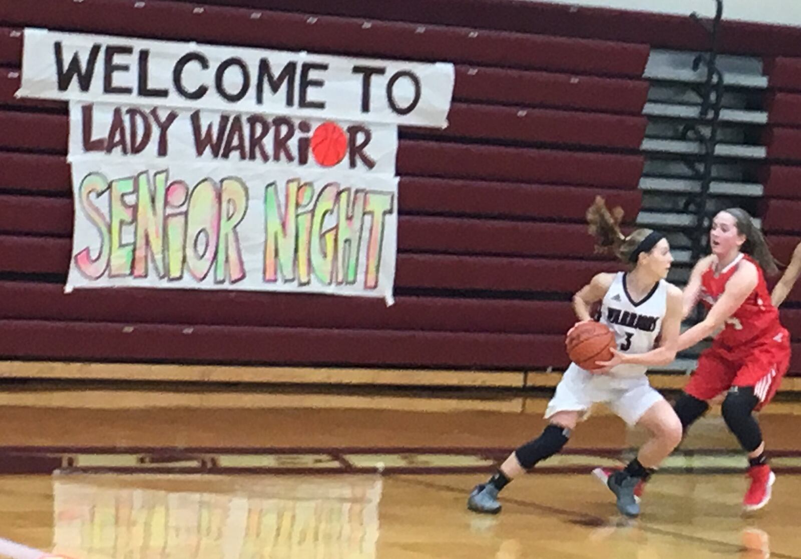 Lebanon’s Sydney Hanna (3) is guarded by Fairfield’s Kayla Summerville (34) on Monday night at Lebanon. Hanna was one of three Warriors honored on Senior Night. RICK CASSANO/STAFF