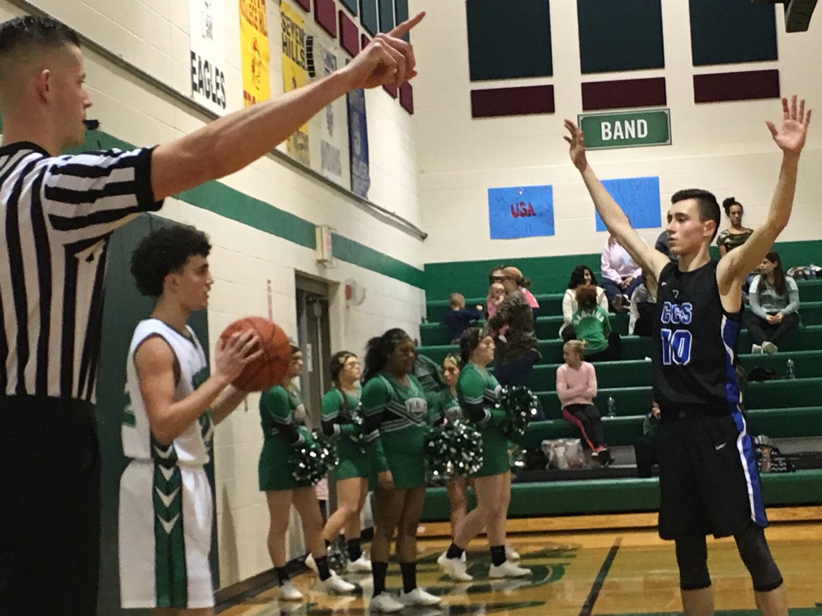 New Miami’s Jordan Robinette (22) prepares to inbound the ball as Cincinnati Christian’s Cole Martin (10) defends Feb. 6 at New Miami. RICK CASSANO/STAFF