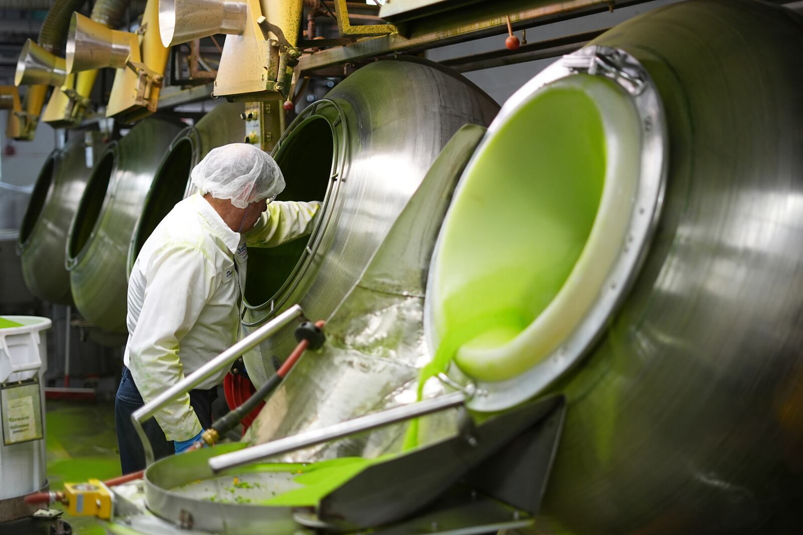 Sugar is unloaded during the Peeps marshmallow treats manufacturing process at the Just Born factory in Bethlehem, Pa., Thursday, April 10, 2025. (AP Photo/Matt Rourke)