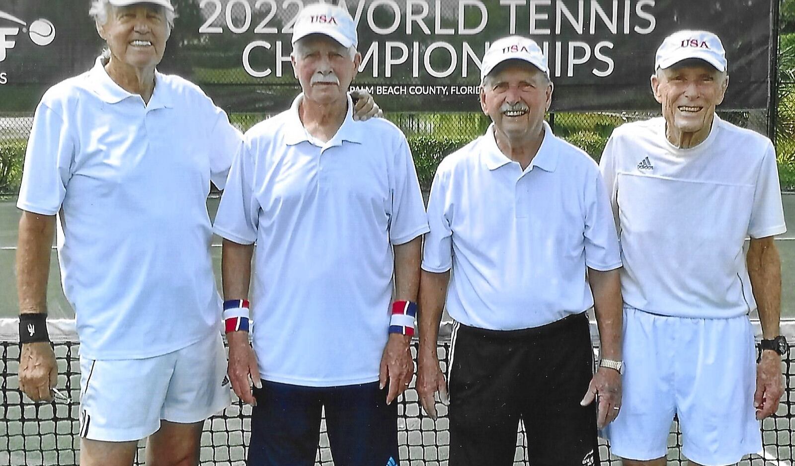 Team winners from the World Tennis Championship are (from left) Herm Ahlers, from Nevada; Jerald Haynes, from Indiana; George McCabe, from Oxford; and King Van Nostrand, from Florida. McCabe, 90, was asked to play with the 85-year-old team in the team event because they were short a player. CONTRIBUTED