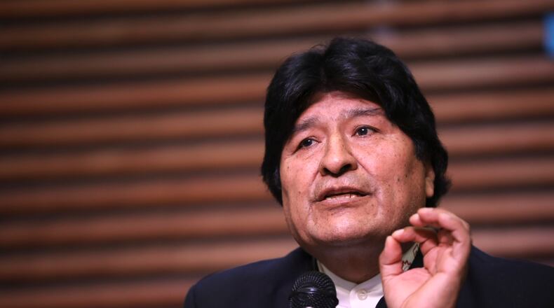 FILE - In this Feb. 21, 2020 file photo, Bolivia's ousted, former President Evo Morales gives a press conference regarding the rejection of his plan to run for Senator in Buenos Aires, where he is living, in Argentina. On Monday, Sept. 7, 2020, a Bolivian court blocked Morales from seeking a senate seat in the country’s October elections, arguing that the ex-leader, living in Argentina, doesn’t meet residency requirements. (AP Photo/Natacha Pisarenko, File)
