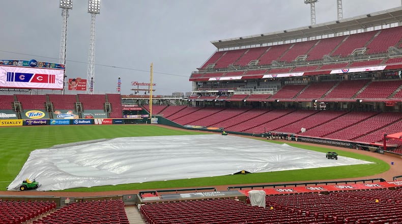 Rain falls at Great American Ball on Thursday, July 30, 2020, in Cincinnati. A game between the Reds and Cubs was postponed by rain.David Jablonski/Staff
