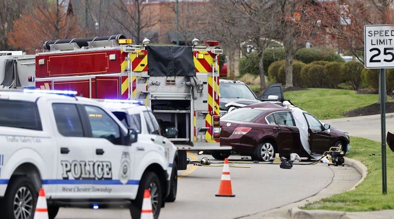 At least one person was killed Tuesday afternoon, April 12, 2022, in front of AMC movie theater on Civic Centre Boulevard in West Chester Twp.  NICK GRAHAM / STAFF