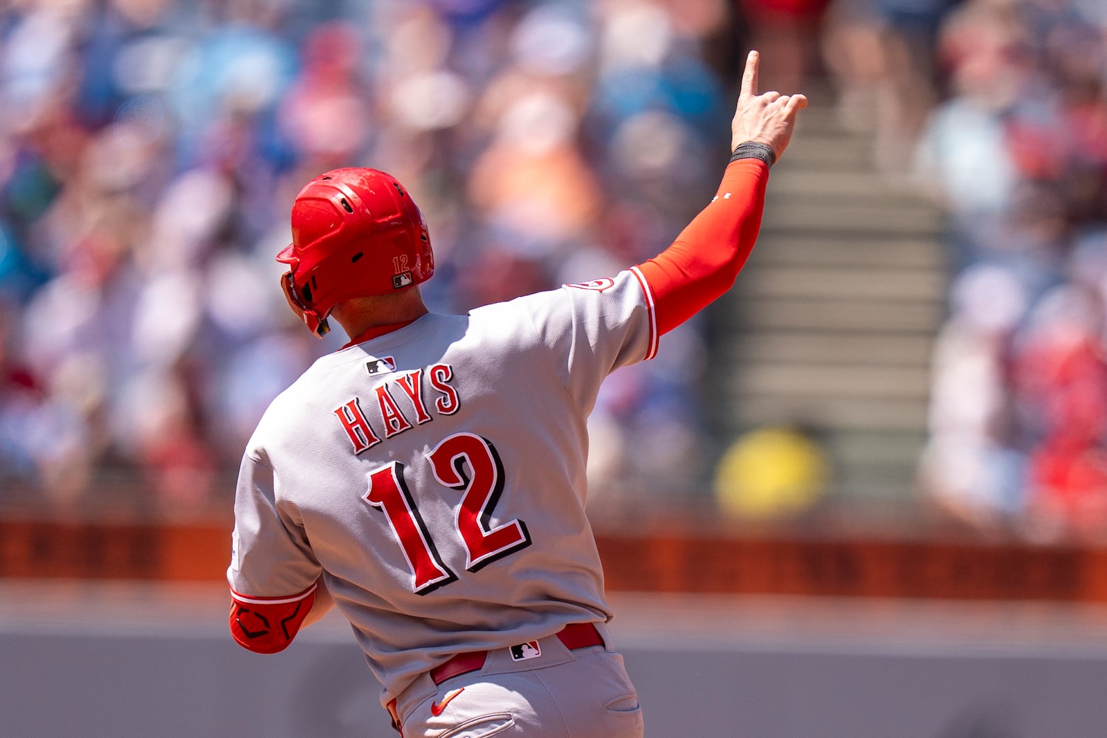 Cincinnati Reds' Austin Hays reacts to hitting a solo home run during the fifth inning of a baseball game against the Philadelphia Phillies, Sunday, July 6, 2025, in Philadelphia. (AP Photo/Chris Szagola)