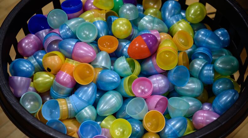 On Friday, March 26, 2021, Play Kettering hosted its annual Adult Easter Egg Hunt, a ticketed event held at the Kettering Recreation Complex. Attendees hunted for plastic eggs behind the complex in the dark with flashlights. The eggs included candy, numbers to redeem for prizes and raffle tickets to enter to win themed gift baskets. Did we spot you there? TOM GILLIAM / CONTRIBUTING PHOTOGRAPHER