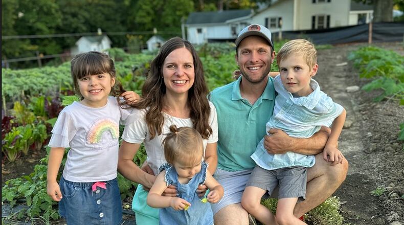 Weathertree Farm and Market owners Wes and Mindy Flach are seen here with their family and the have had a unique journey to owning a farm. They started in Christian ministry and working with people in recovery from addiction. That work inspired the idea of a working farm with a focus on caring for the earth and those on the margins of society. CONTRIBUTED.