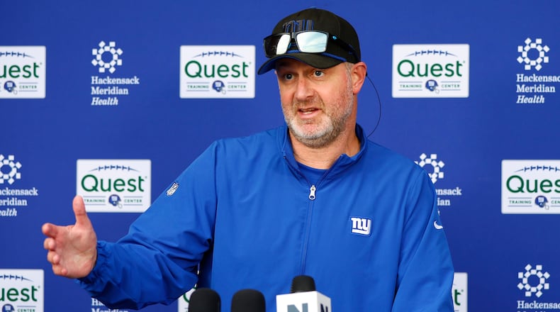 FILE - New York Giants defensive coordinator Shane Bowen talks to reporters before NFL football practice in East Rutherford, N.J., Thursday, June 5, 2025. (AP Photo/Noah K. Murray, file)