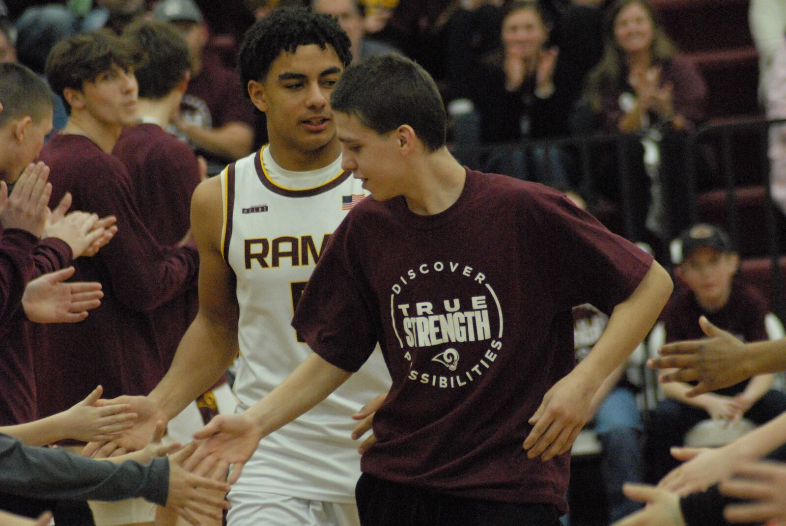 Ross High School's Jacob Coomer (front) and Riley Caldwell were introduced before the Rams tipped off against Harrison on Feb. 6 during True Strength Night. CONTRIBUTED