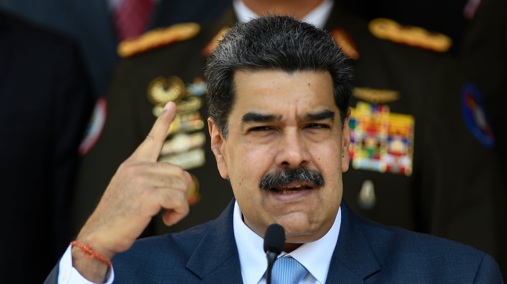 FILE - In this March 12, 2020, file photo, Venezuelan President Nicolas Maduro gives a press conference at the Miraflores presidential palace in Caracas, Venezuela. (AP Photo/Matias Delacroix, File)