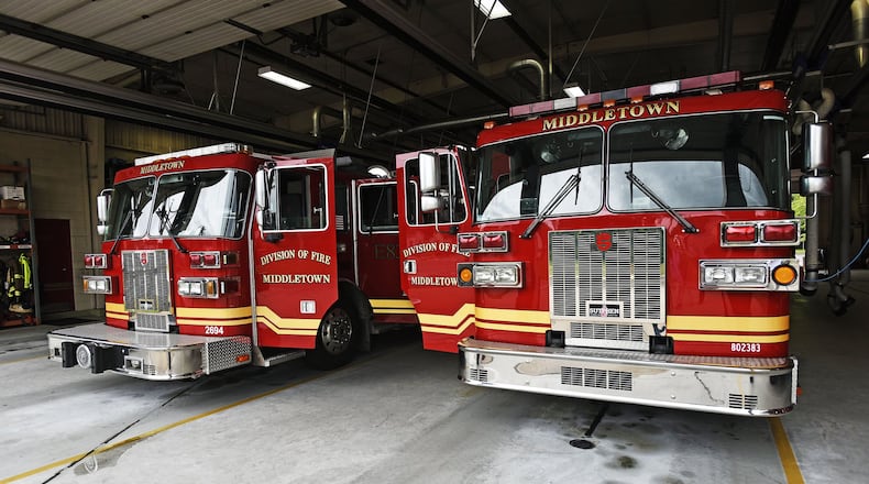 Fire engines and medic units recently sat in the Middletown Division of Fire headquarters on Roosevelt Boulevard in Middletown. The Middletown Division of Fire has received a $1.8 million federal SAFER grant (Staffing for Adequate Fire and Emergency Response) that will allow it to employ 12 additional firefighter EMTs in 2017. NICK GRAHAM/STAFF