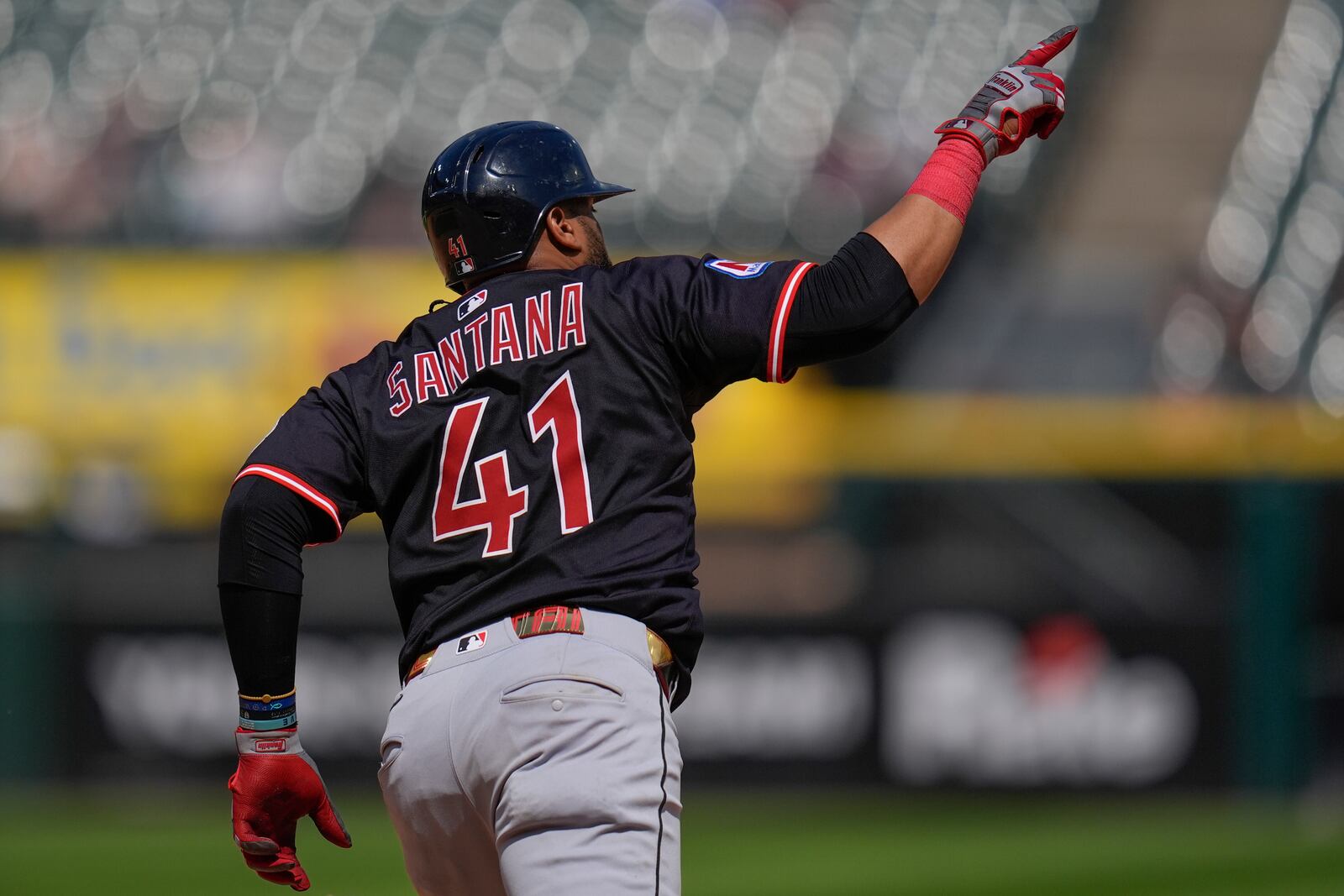 Cleveland Guardians' Carlos Santana runs the bases after hitting a two-run home run during the sixth inning of the first baseball game of a doubleheader against the Chicago White Sox, Friday, July 11, 2025, in Chicago. (AP Photo/Erin Hooley)